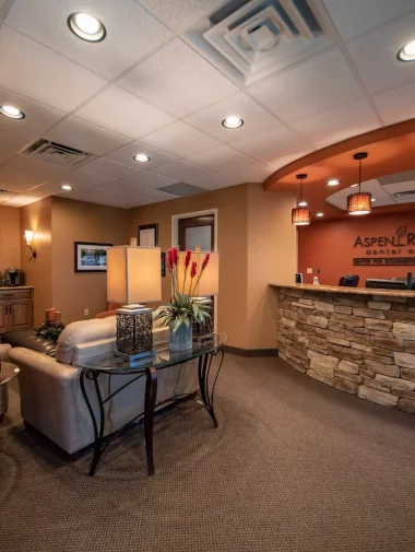 Interior Makeovers Collections 7 Wide shot of the entryway into Aspen Ridge dental care office in Colorado. Ambiance and decor by Interior Makeovers.